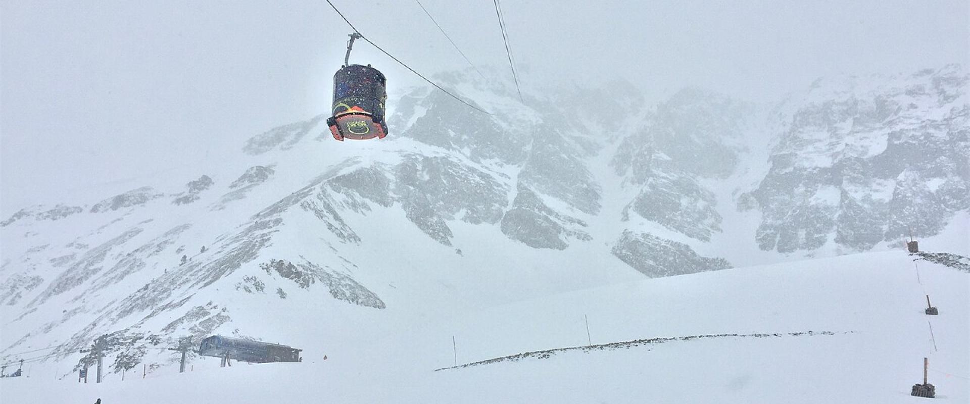 A Lone Peak Tram cabin in winter cloud