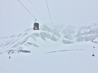 A Lone Peak Tram cabin in winter cloud