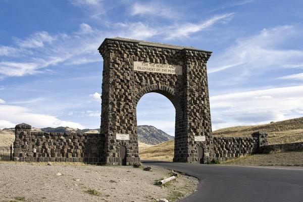 The stone Roosevelt Arch at the North Entrance to Yellowstone National Park in Gardiner