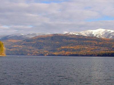 Whitefish Lake in autumn with Whitefish Mountain Resort behind